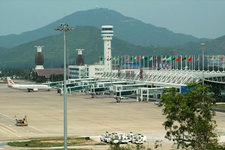 Aircraft, terminal and control tower at Sanya Phoenix International Airport
